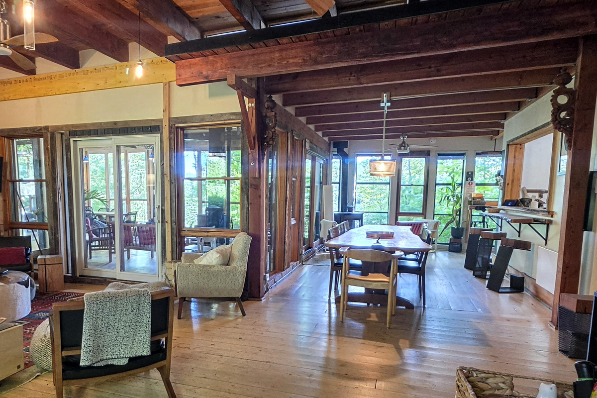 Main cottage interior from front door with spacious living and dining areas