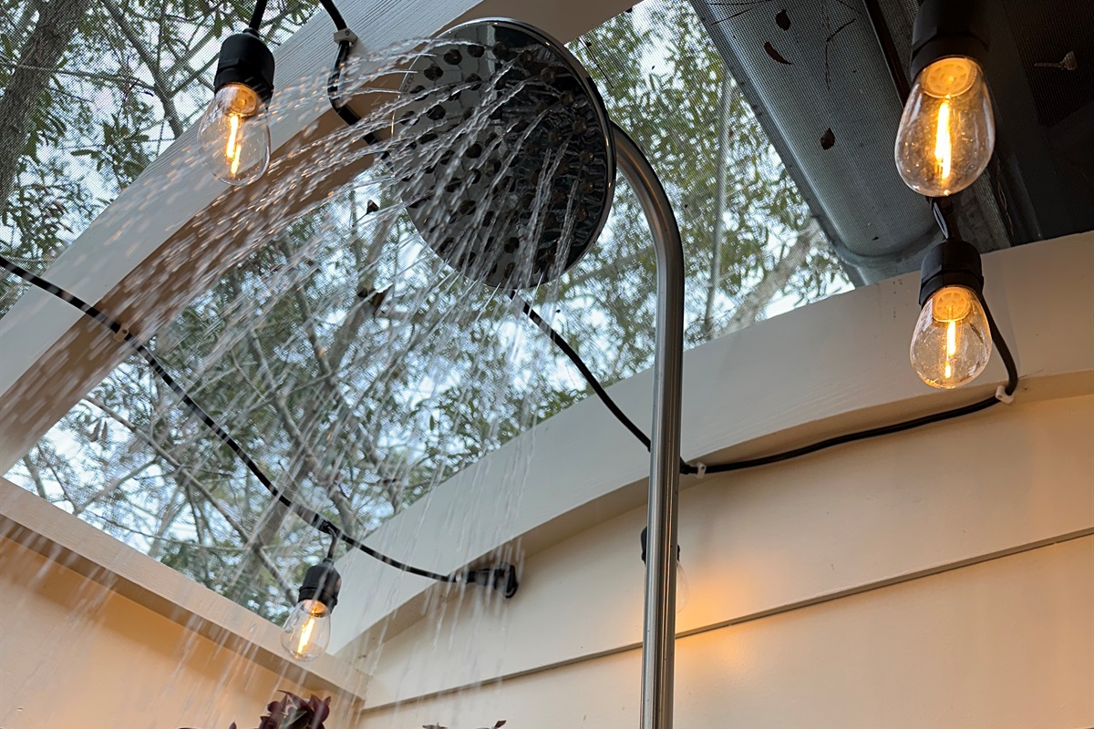 Outdoor private shower with ambient lights perfect for a late night shower under the stars. Right off 2nd floor king suite's private ensuite bathroom.