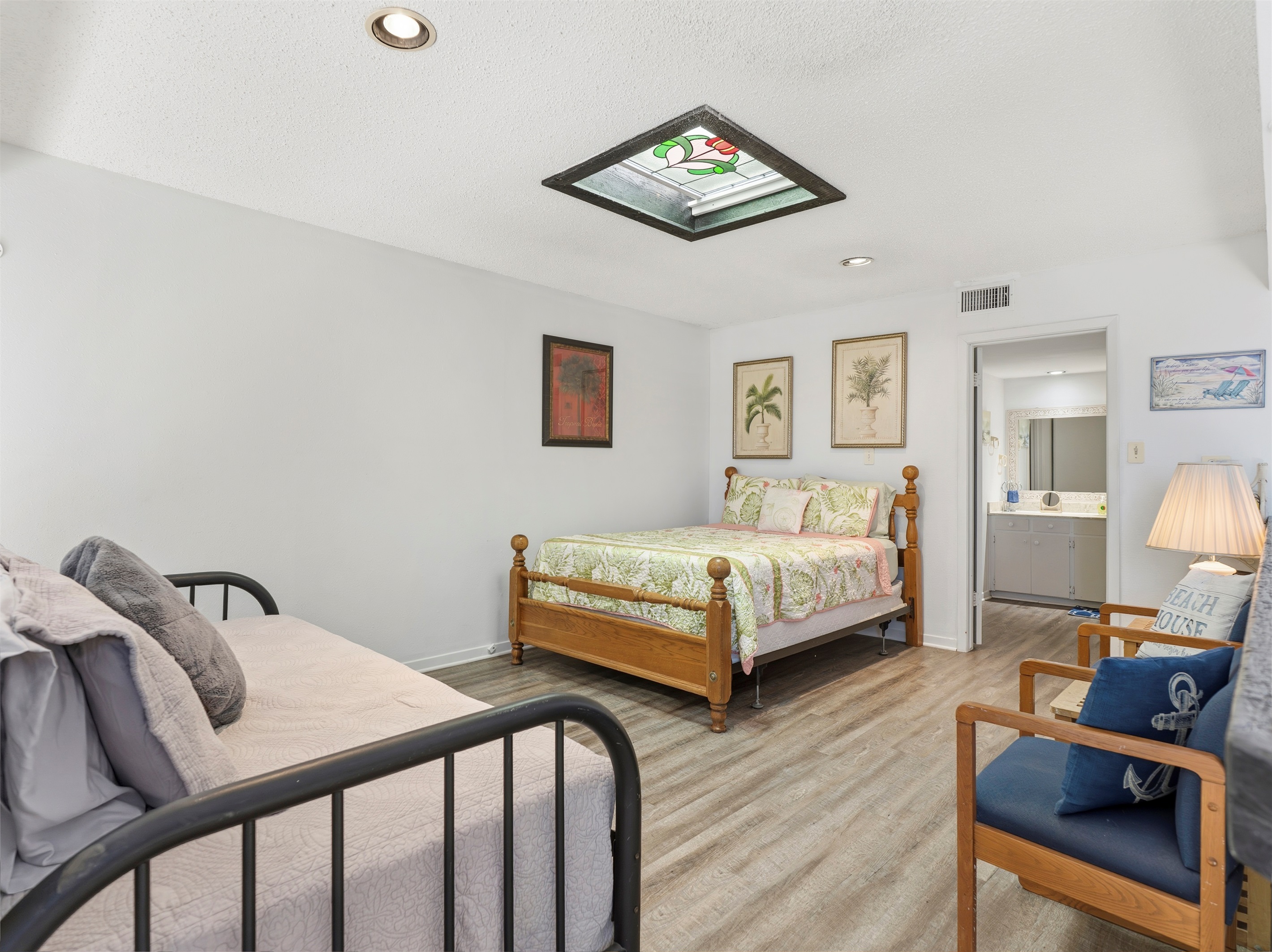 king bed and twin bed in loft area