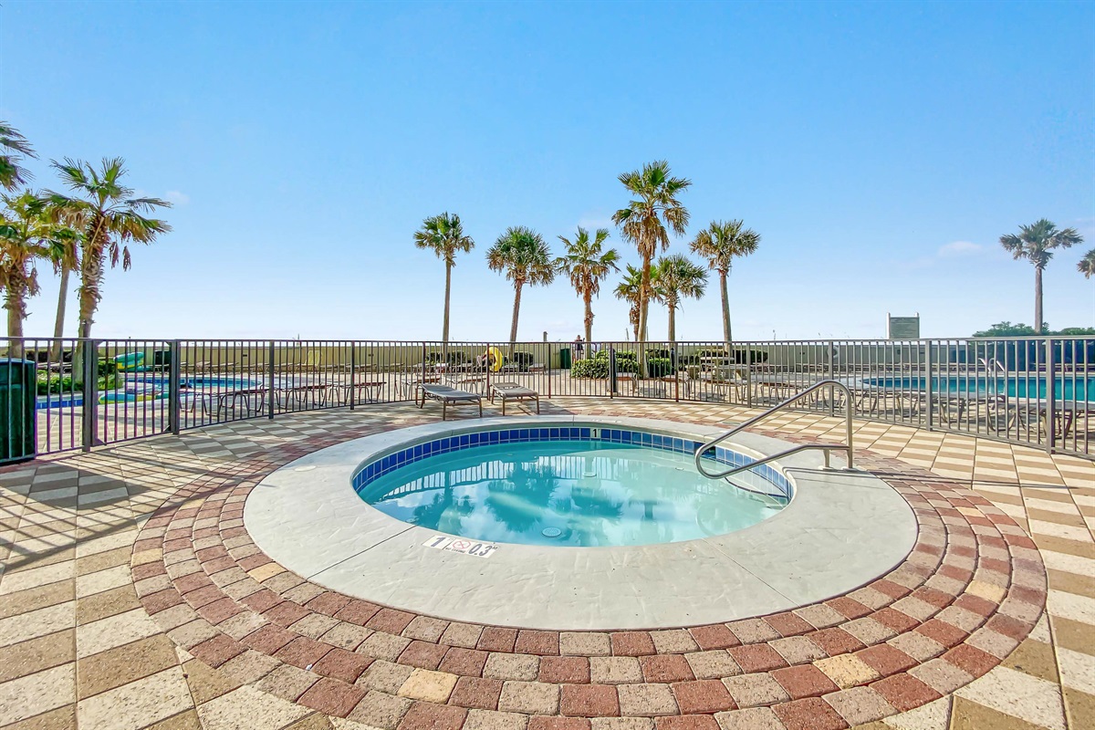 Take a soothing dip in the outdoor hot tub after a day on the sand. Surrounded by tropical palms and a cool coastal breeze, it’s the perfect place to watch the sunset.