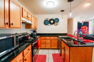 Welcome to the heart of culinary creativity! Our kitchen is fully equipped with everything you need to whip up your favorite dishes, from morning brews to gourmet meals. 🍳☕ #KitchenEssentials #HomeChe