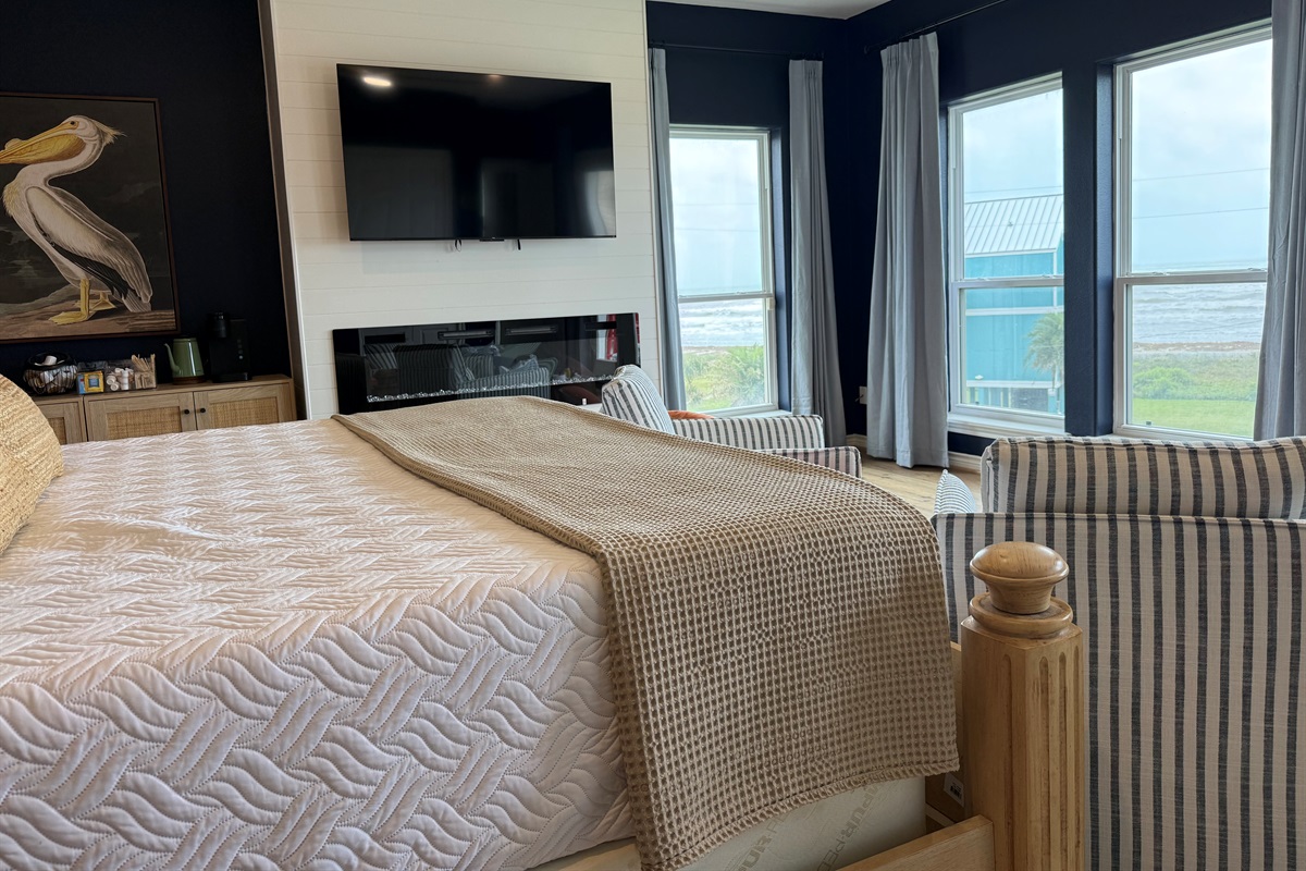 Beautiful bedroom suite for relaxing and watching the waves. Access to your deck is right outside for morning coffee. 