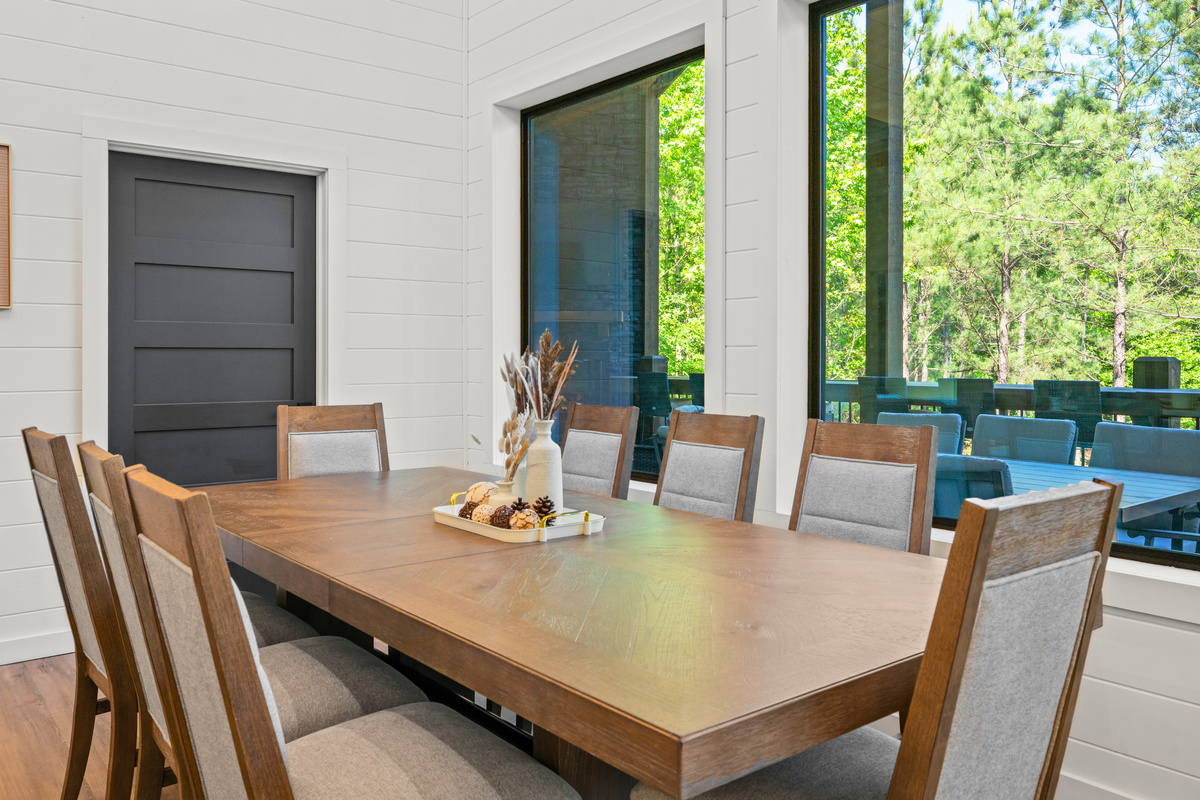 Gather around the dining table for breakfast, board games, or a family-style dinner after a day on the lake or trails.