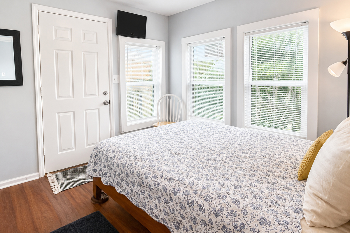 Bedroom 2 has the best windows AND an exterior door for more light and access.