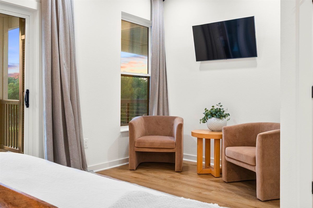 Cozy corner seating in the king suite&mdash;perfect spot for morning reading or quiet moments.