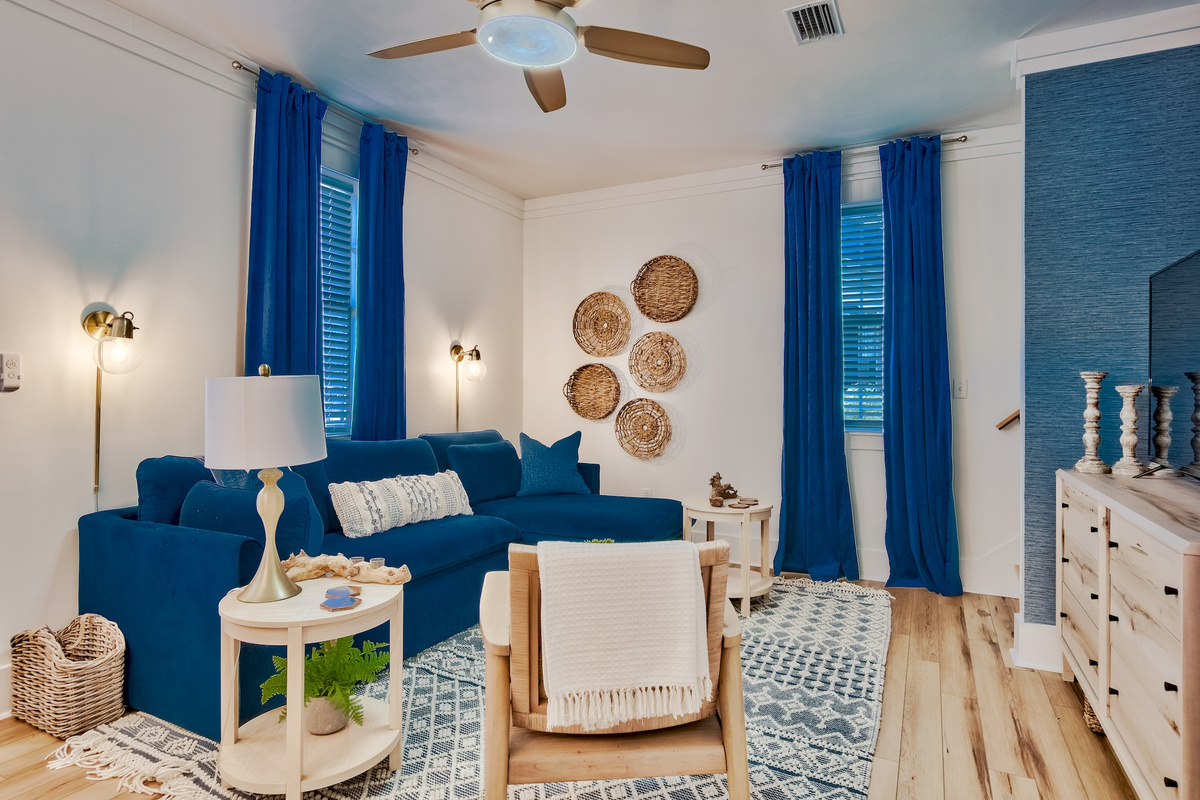 Living room with blue sectional seating
