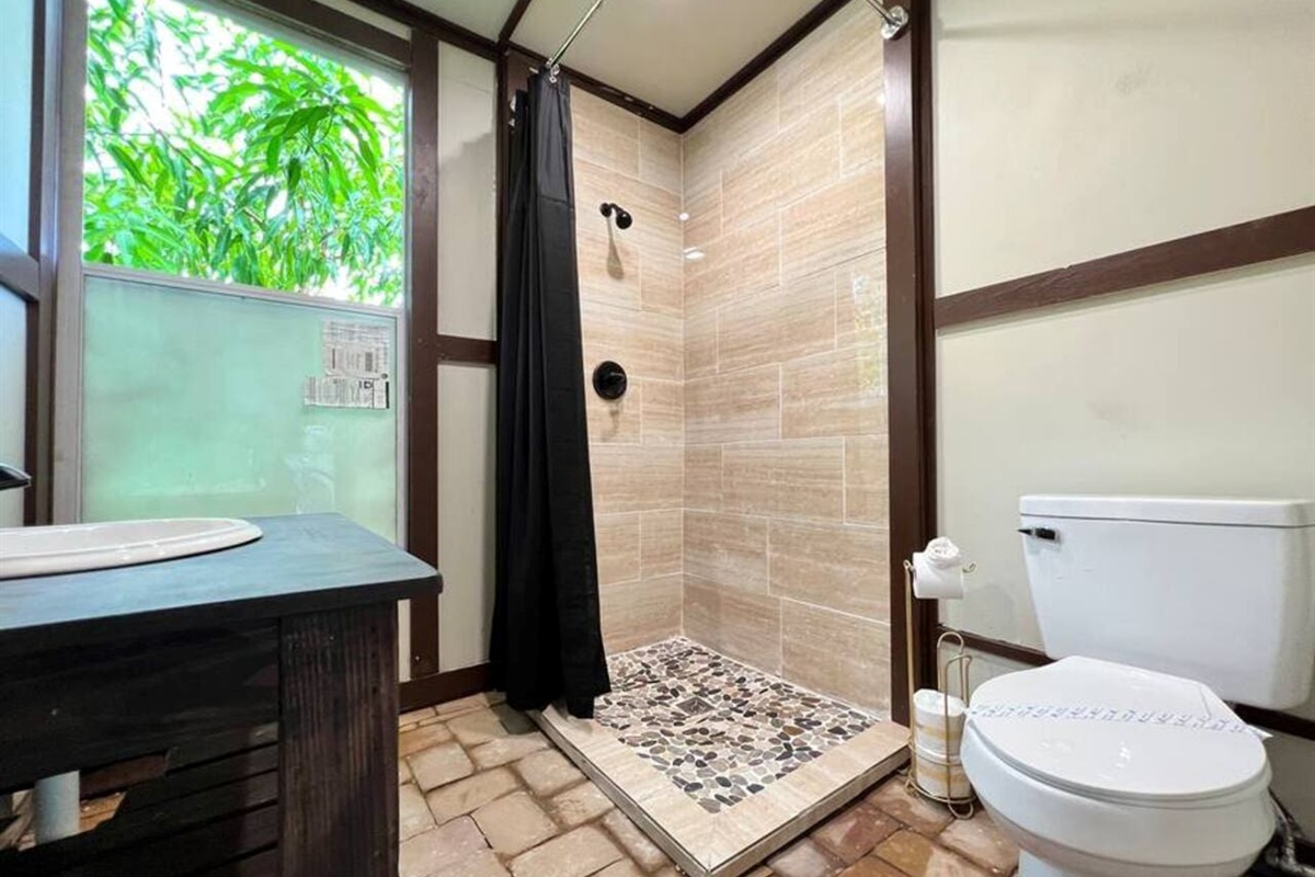 Freshen up in the private poolside bathroom, convenient for swim days and outdoor gatherings.
