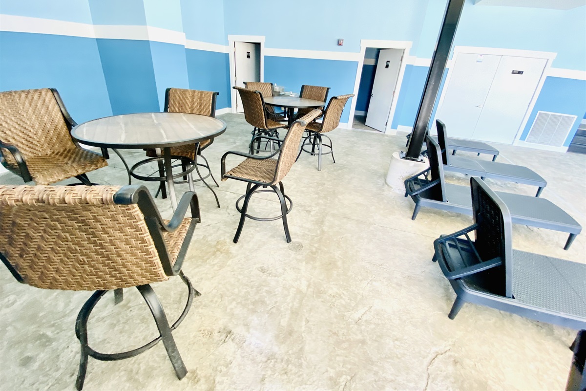 Seating options and bathrooms for the indoor pool area