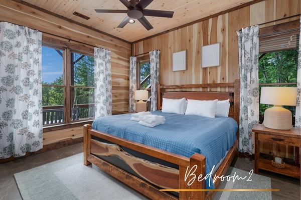 Another master bedroom, offering comfort and relaxation with a mountain view.