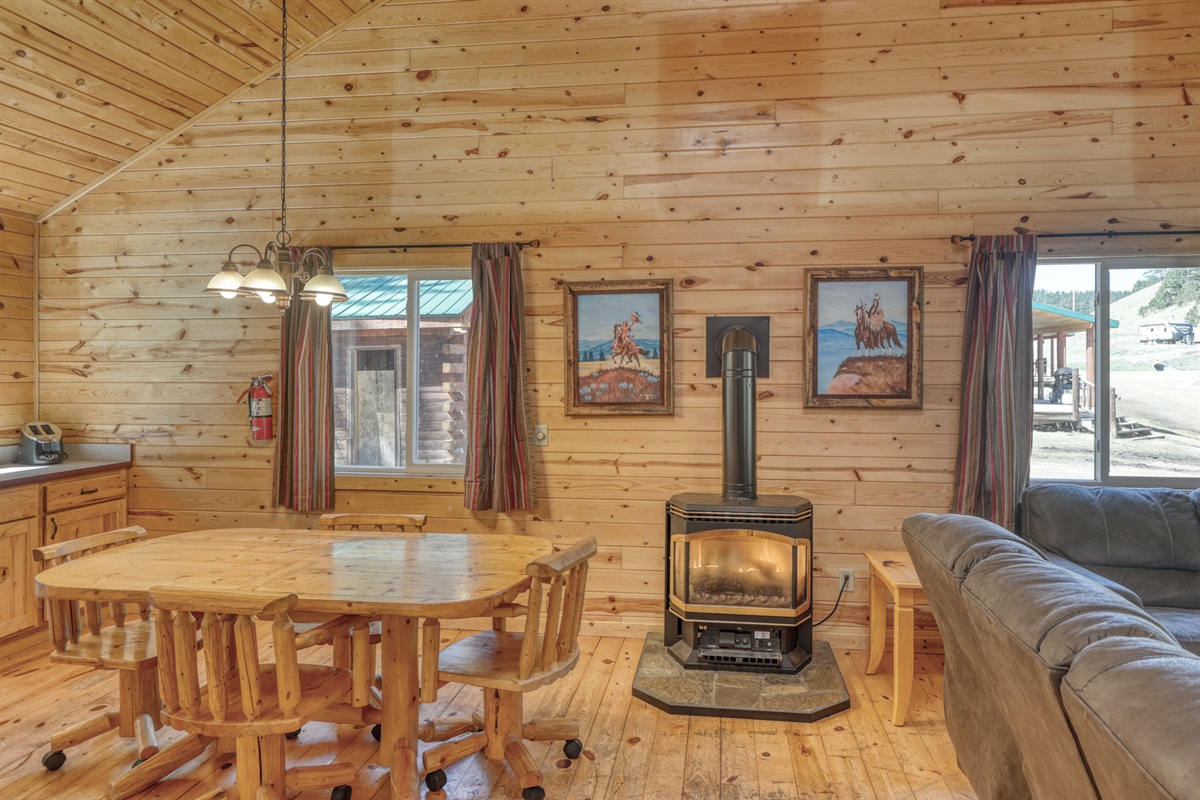 Living area with fireplace and dining area