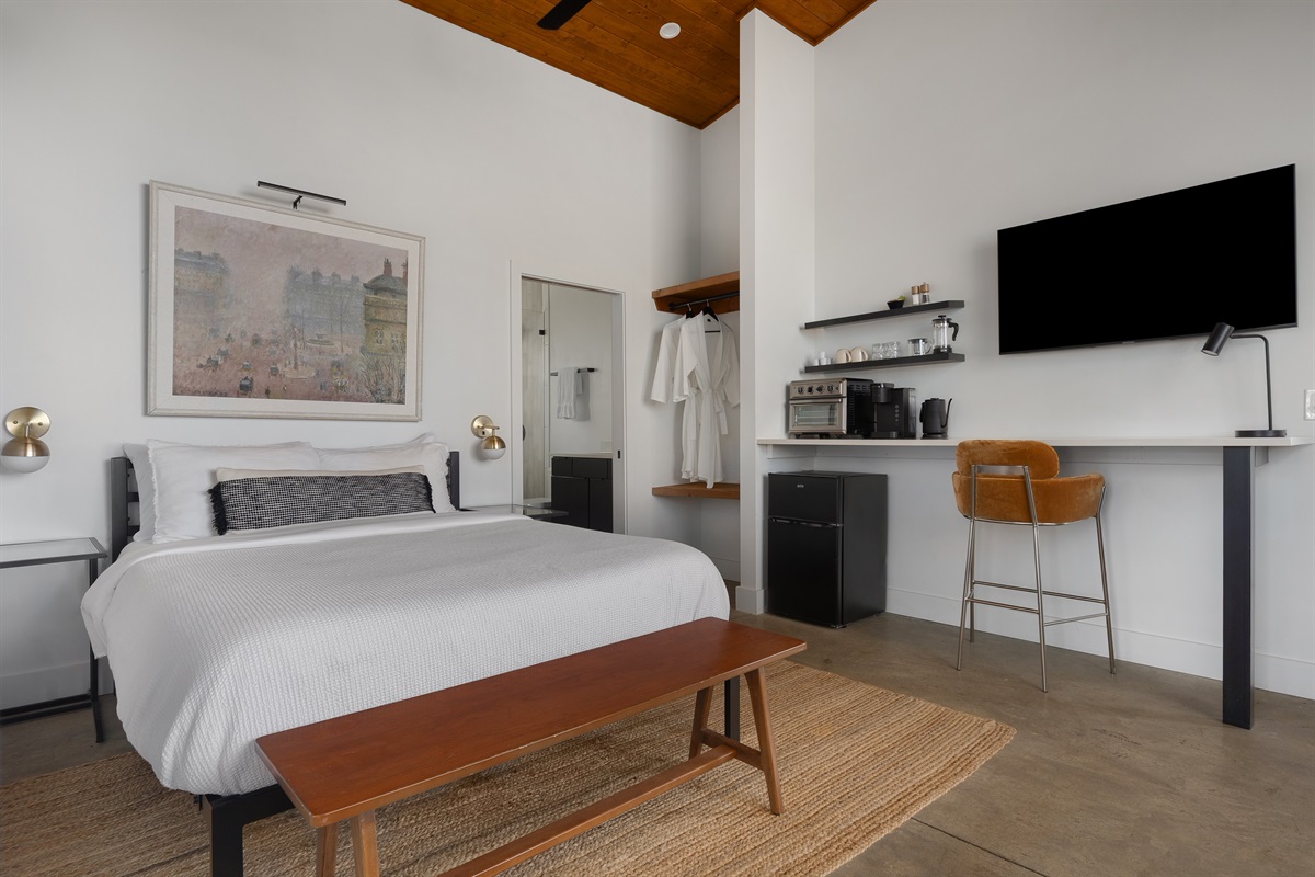 {Casita Bedroom - Glass House} A private studio-style suite with a king bed, ensuite bath, workspace, and a full coffee + kitchenette setup for ultimate comfort.