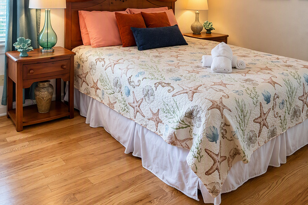 Top-floor Queen suite with a private full bath.
