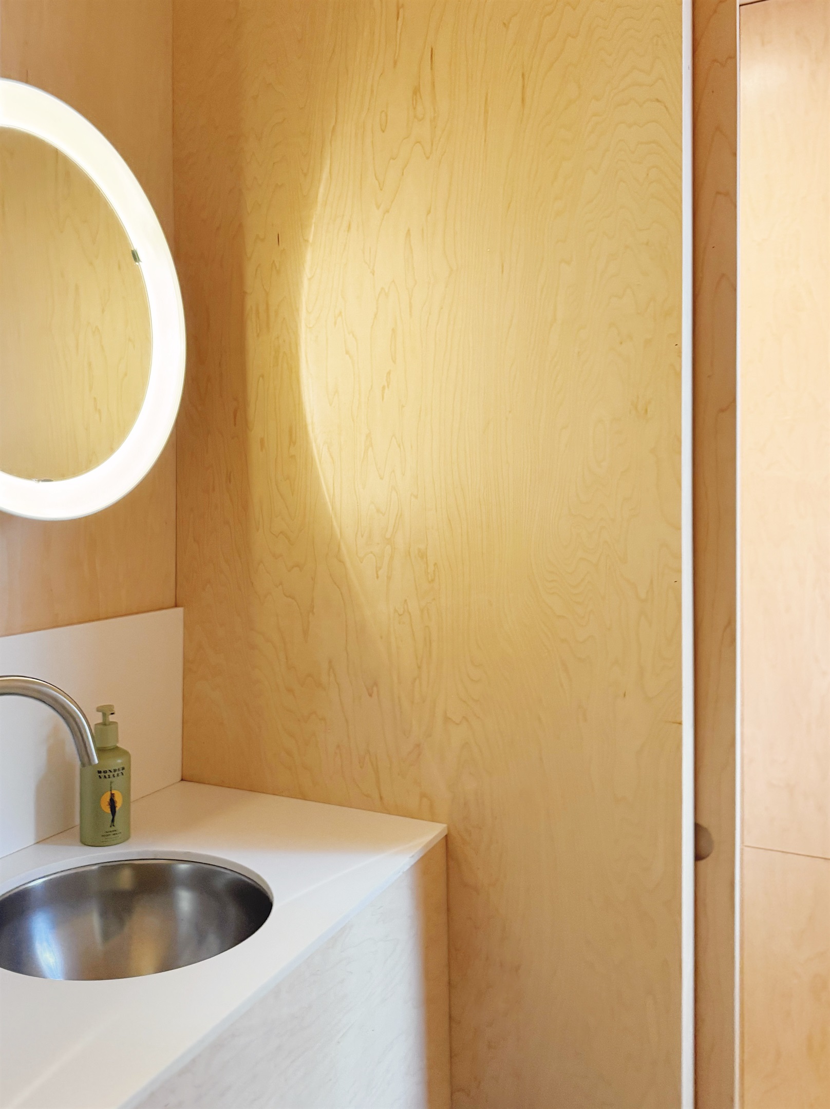 Half bath with Poulson mirror light