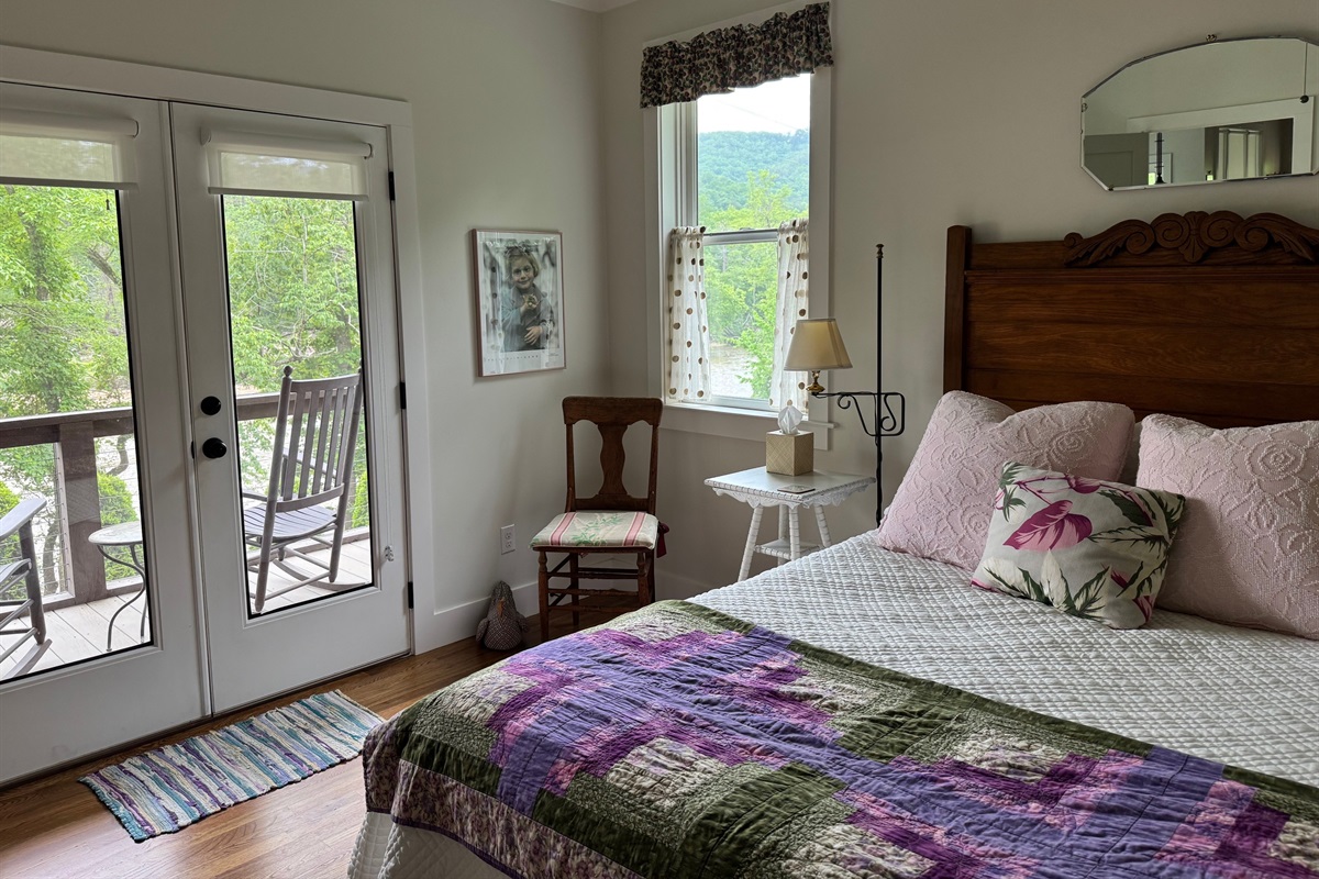 Comfy furnishings create a relaxed and personal feel in the downstairs bedroom