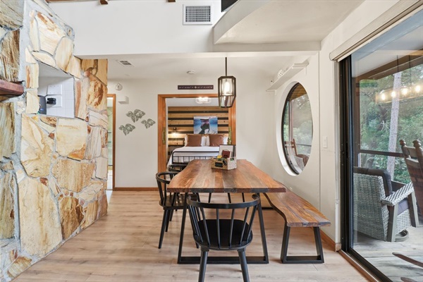 Live edge wood dining table with matching bench and chairs