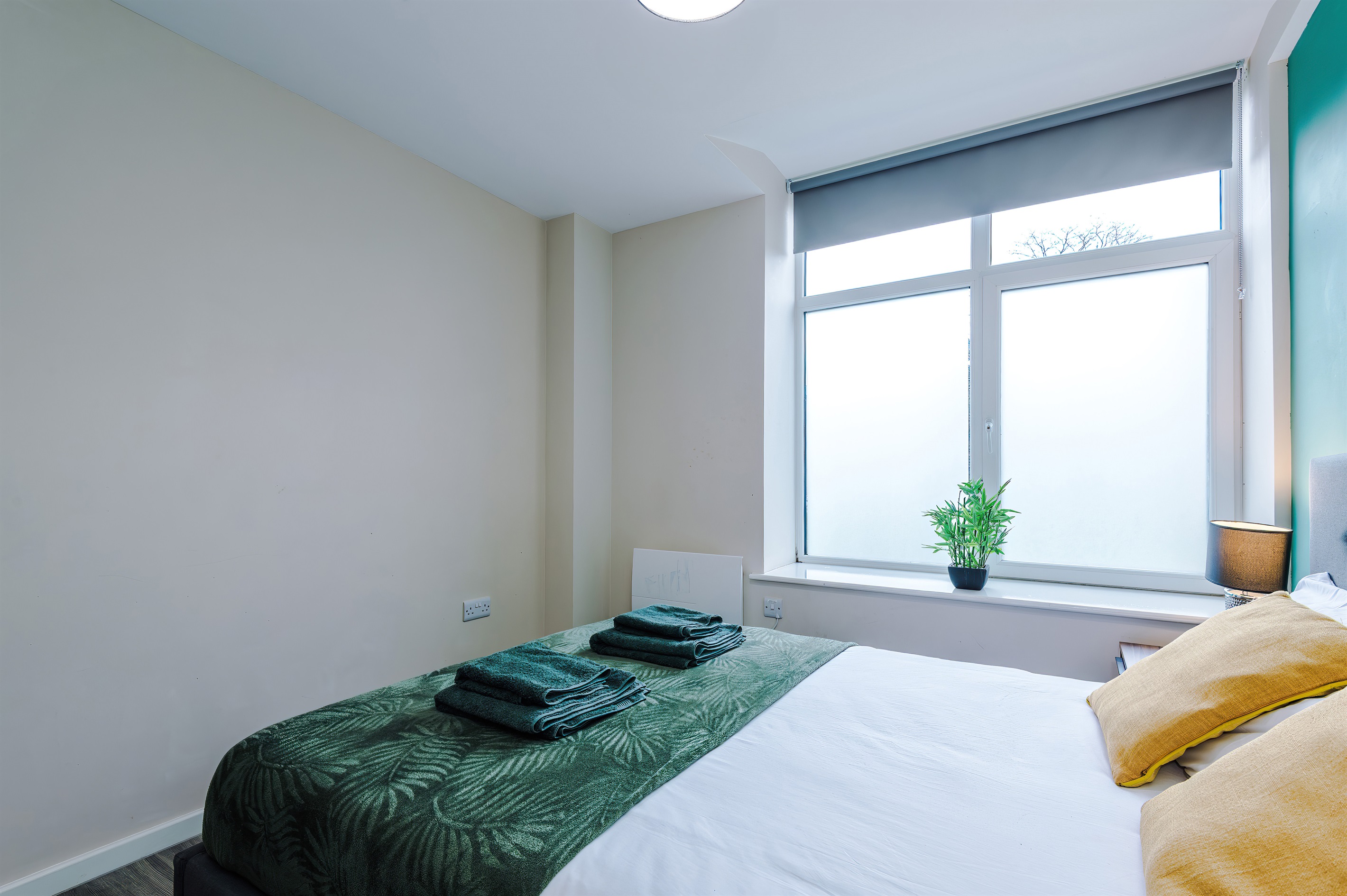 Bedroom 2 benefits from a hotel comfort large double bed, wardrobe with hangers & blackout blinds 