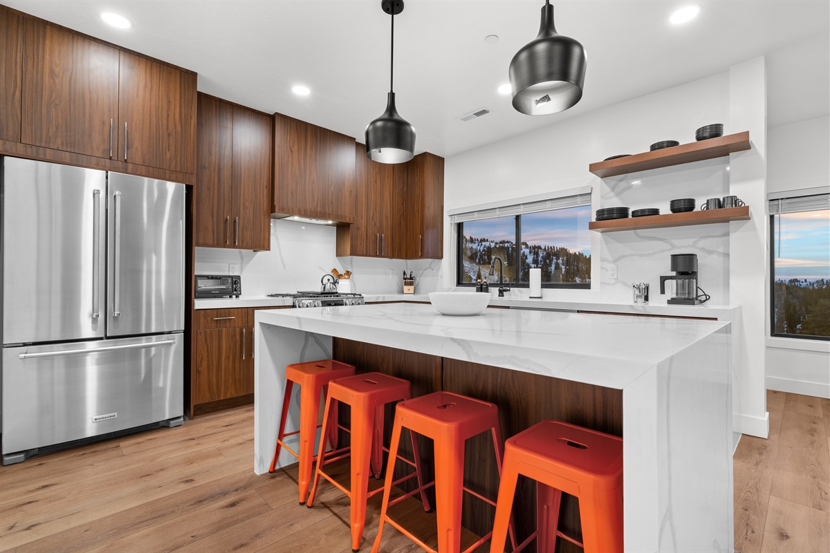 Fully equipped modern kitchen with quartz countertops — perfect for fueling adventures.