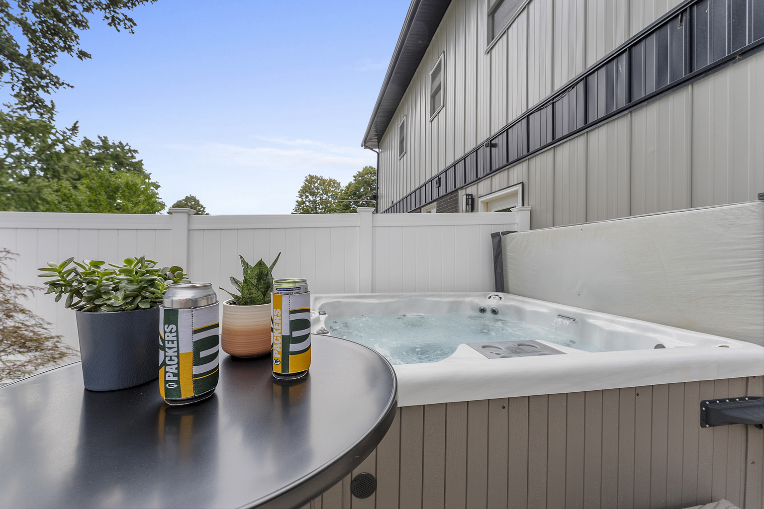 Private 6-person hot tub — perfect for relaxing after game day.