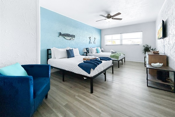 🐳 “Whale Room” sleeps 4 — biggest bedroom. Two queen beds.