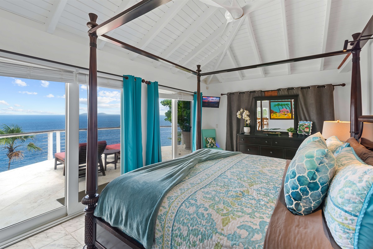 The primary bedroom has views that will keep you lounging in bed to enjoy