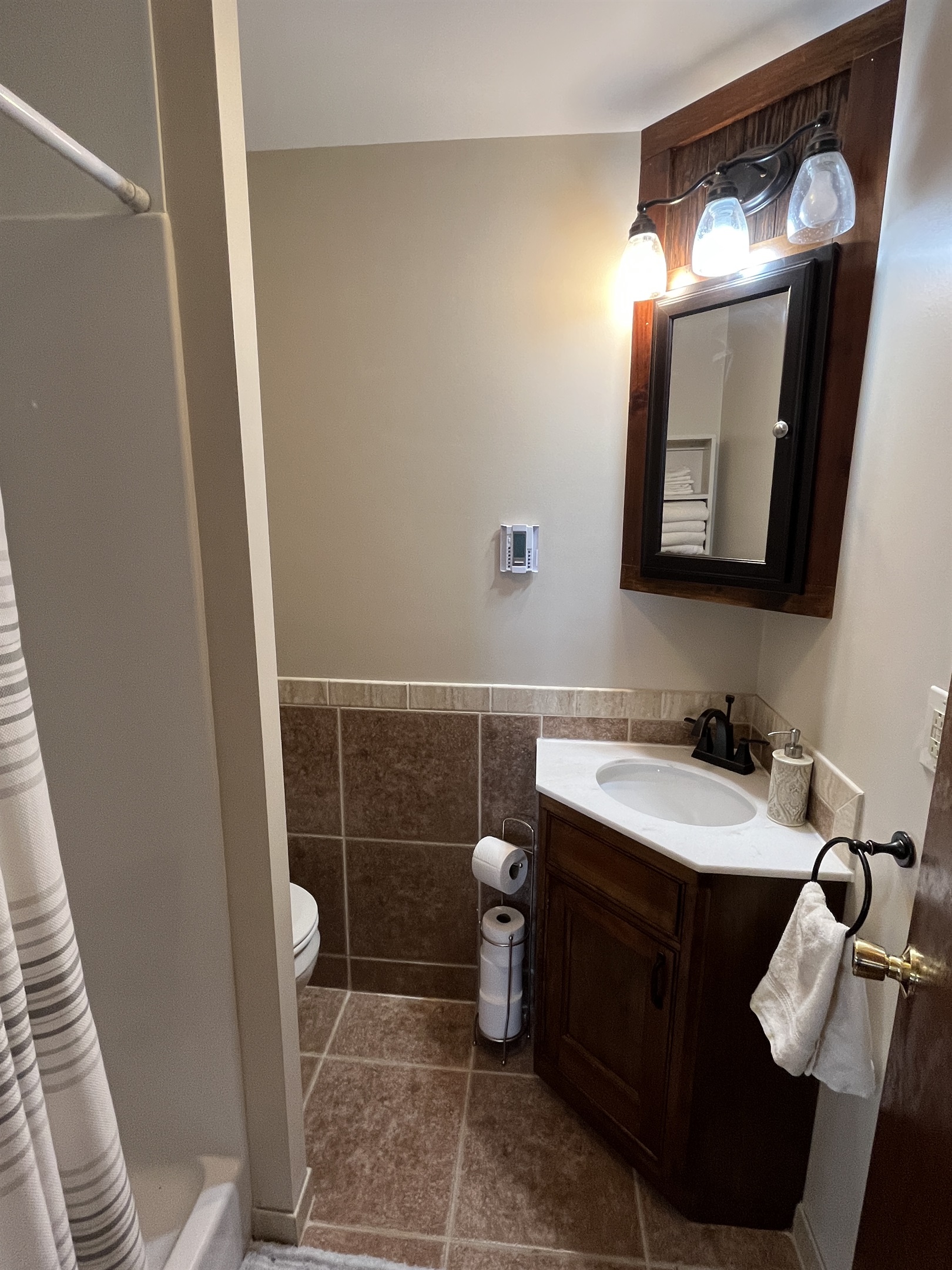Lower level bathroom with shower.