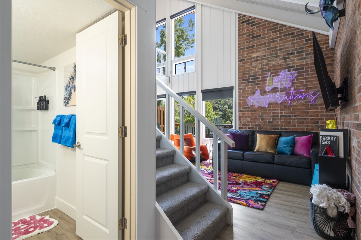 Lower full bathroom and comfy living room streaming all your favorites!