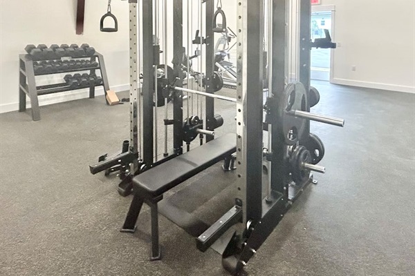 The community gym is well-equipped for your workout, including a variety of free weights and a multi-purpose rack.