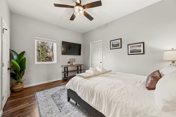 Bedroom 2 has a queen bed and ensuite bathroom