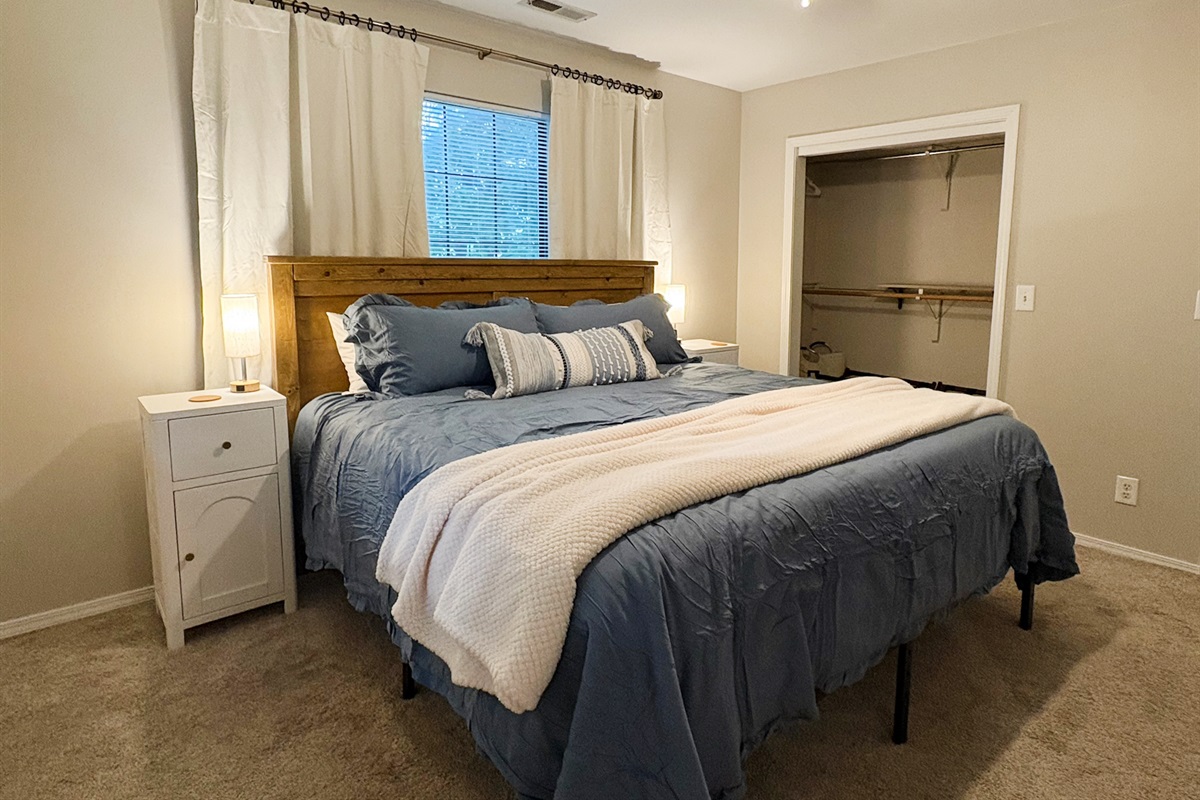 Spacious Closet with Luggage Racks & Laundry Hamper