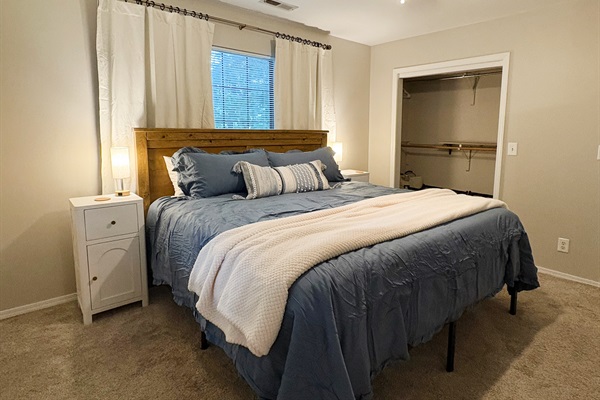 Spacious Closet with Luggage Racks & Laundry Hamper