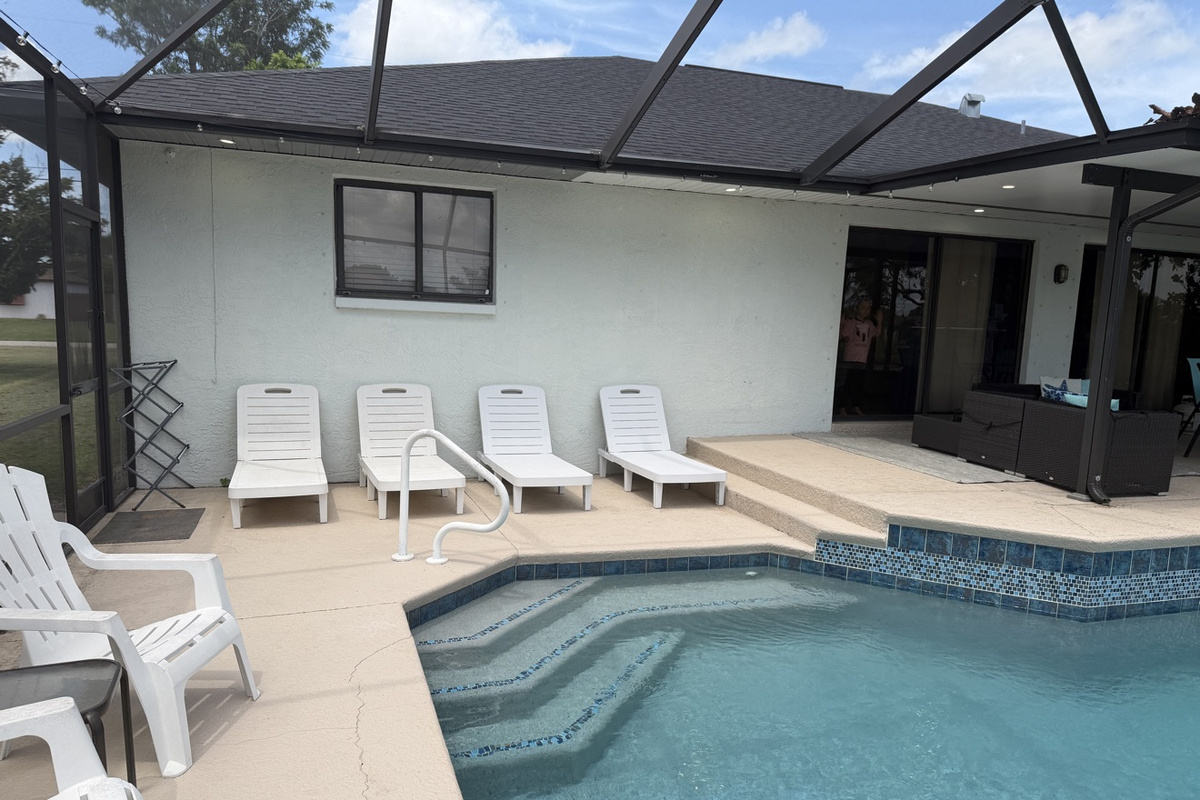 Pool deck with lounge chairs