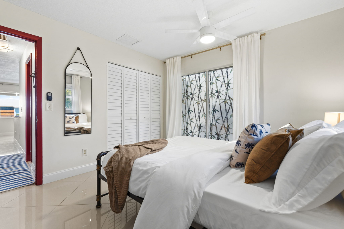 Long length mirror with closet stocked with hangers