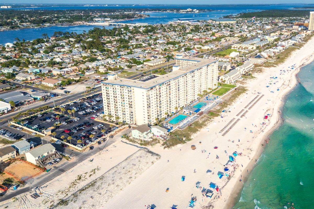 Your beachfront condo is right on the sand, with pools and ocean waves just steps away.