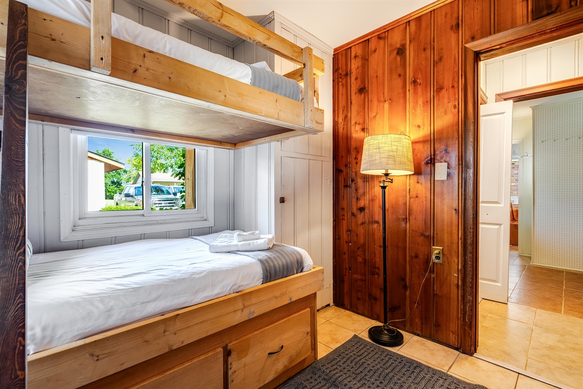 Hand-built bunks with natural wood finishes.