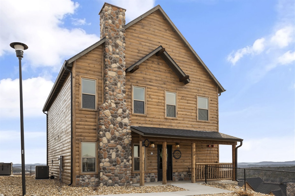 Front elevation of the home. Parking spots right out front.