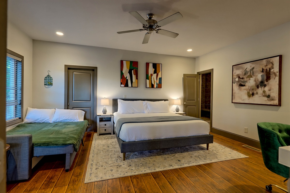 Master king bedroom with a queen sofa bed for extra sleeping space.