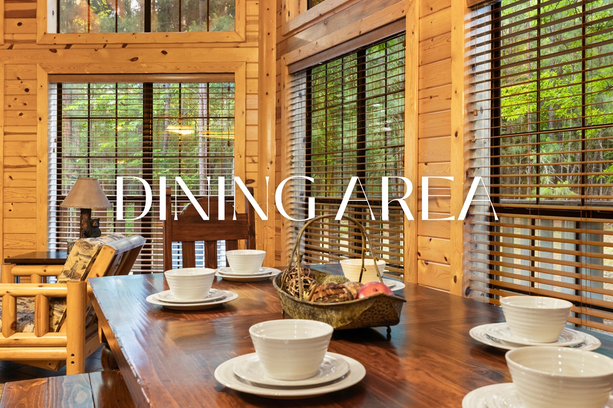 Dining area with rustic table—meals with a view.
