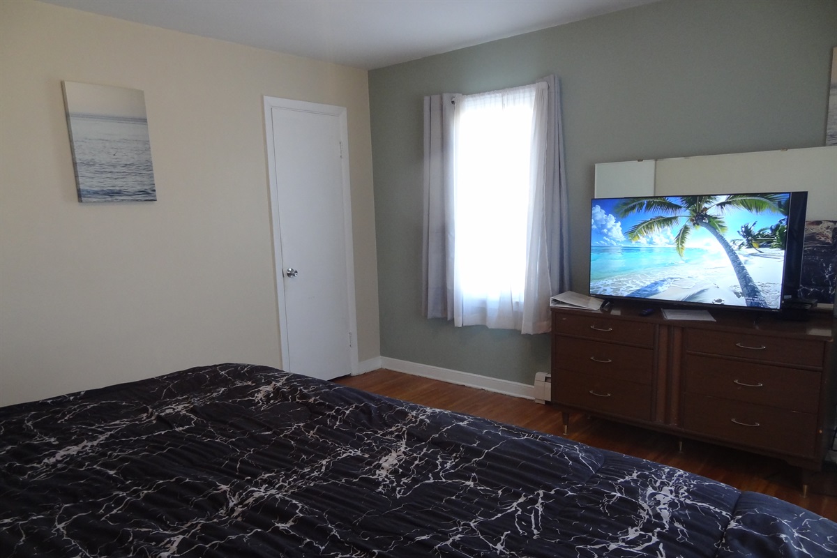 King bed with Roku smart TV