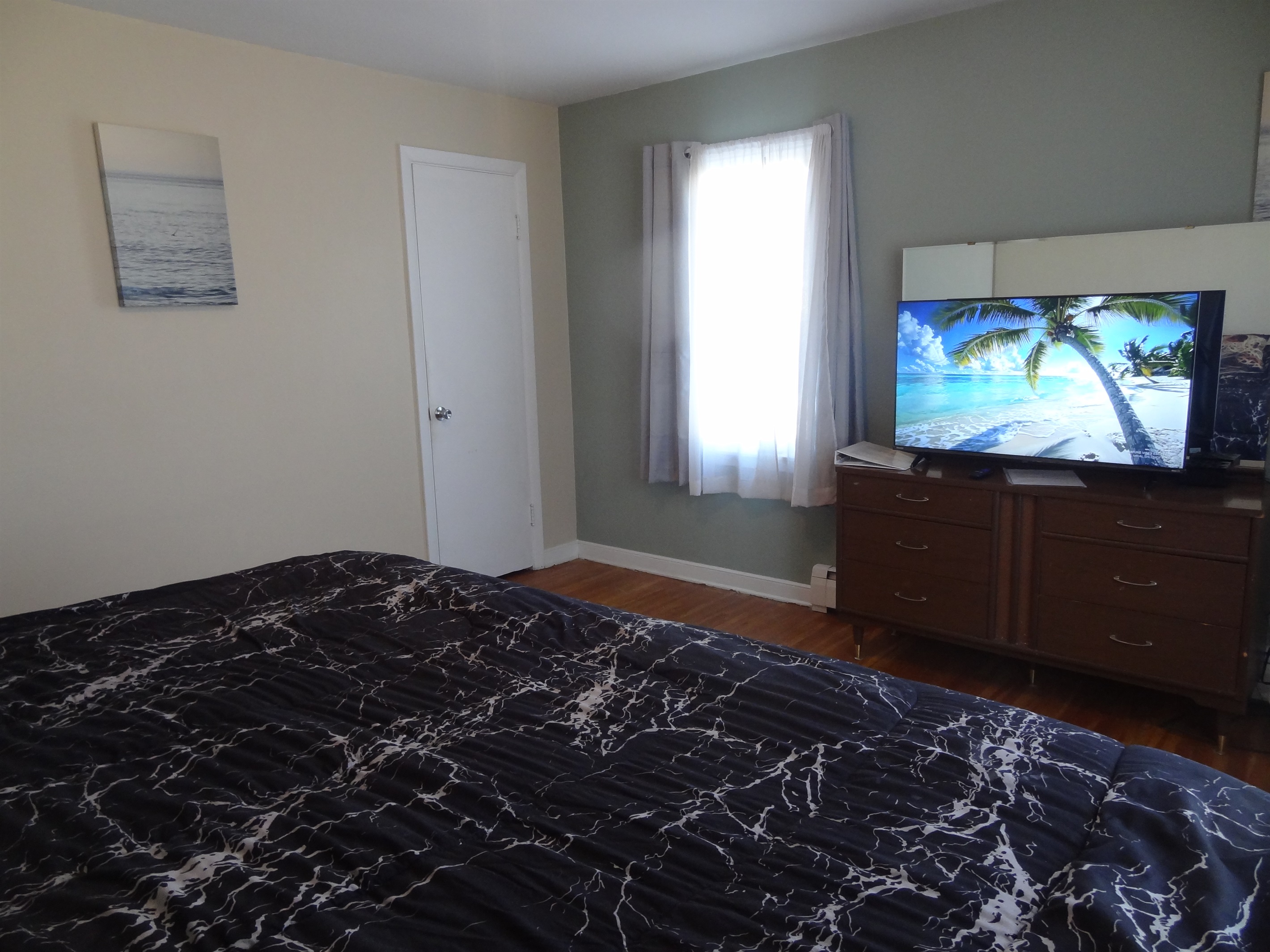 King bed with Roku smart TV