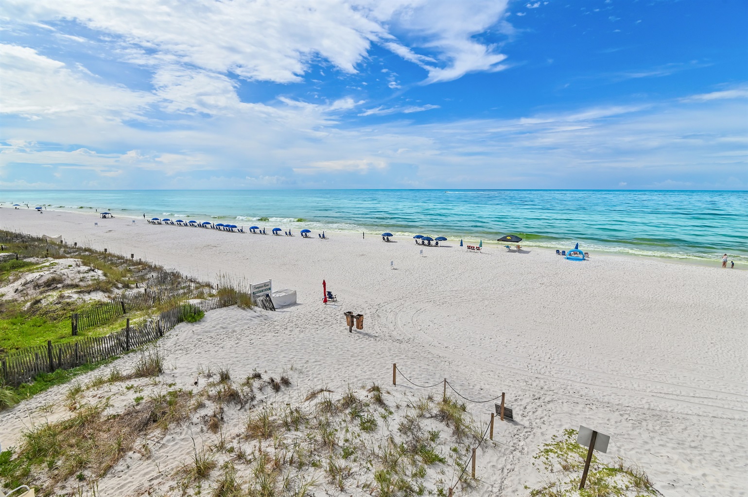 Looking East, South or West, you see nothing but Emerald waters and White Sand