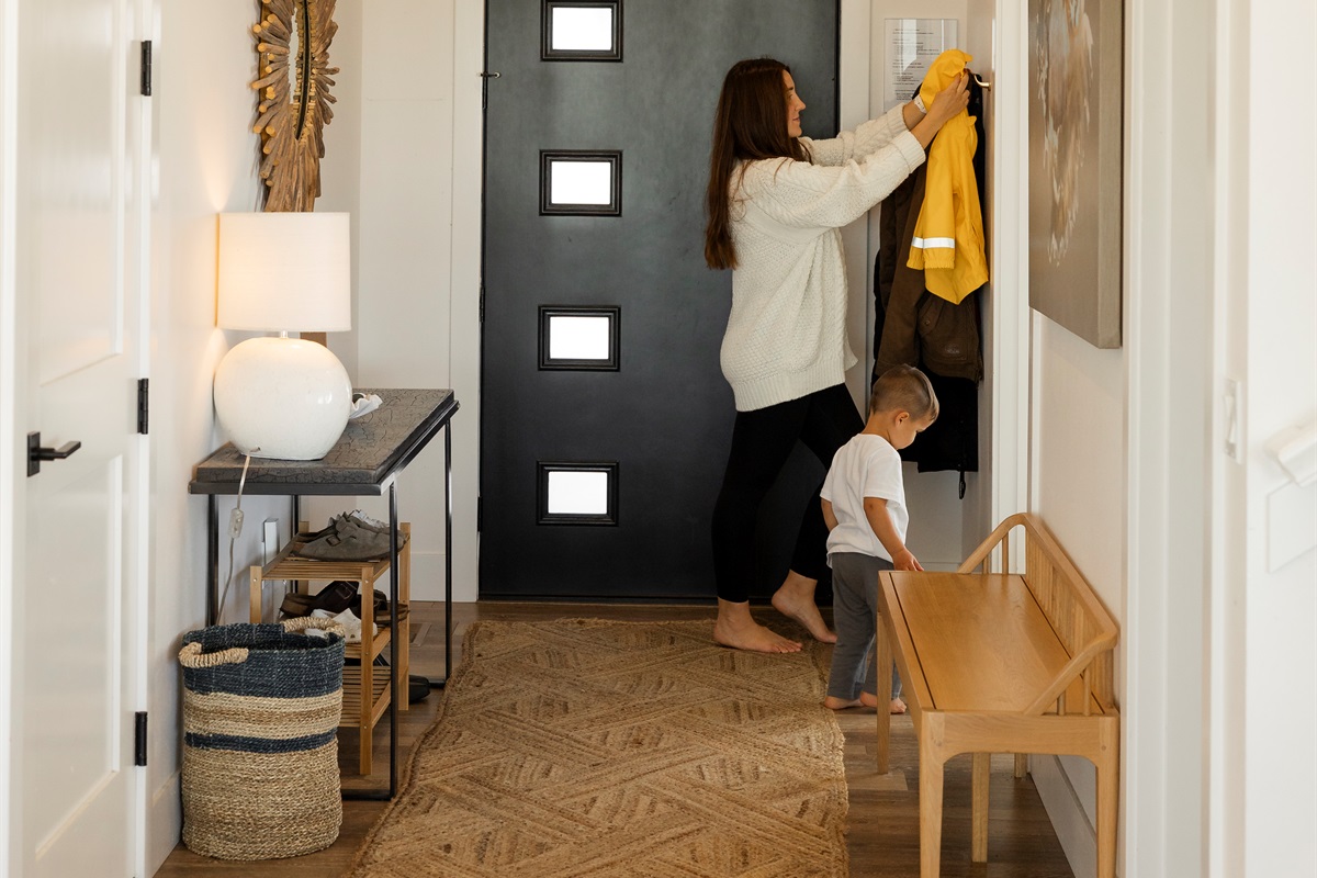 {Foyer} A cozy coastal welcome — hang up your coat and let the ocean views do the rest.