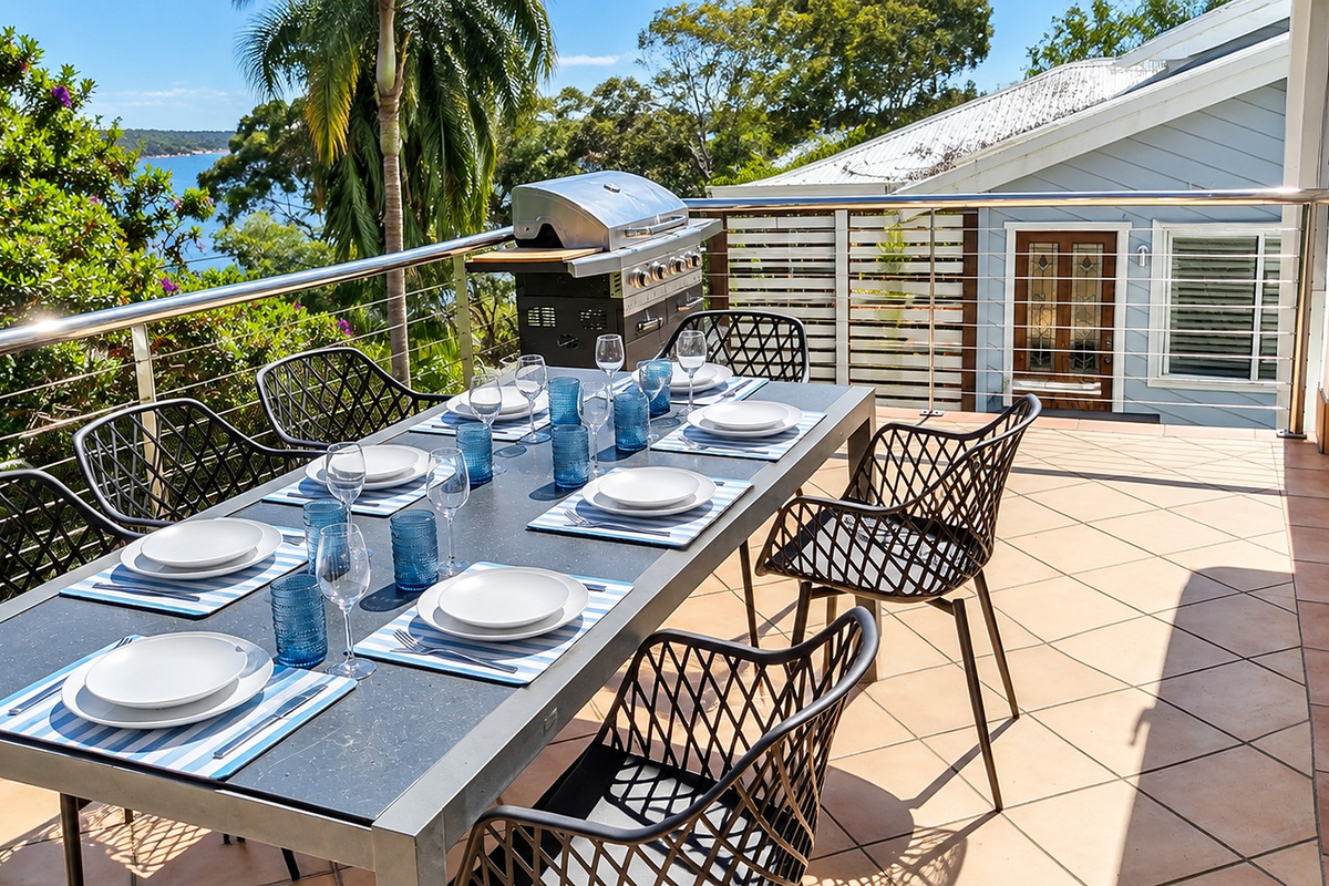 Enjoy alfresco dining on the sun-filled terrace, complete with a barbecue and beautiful water views.