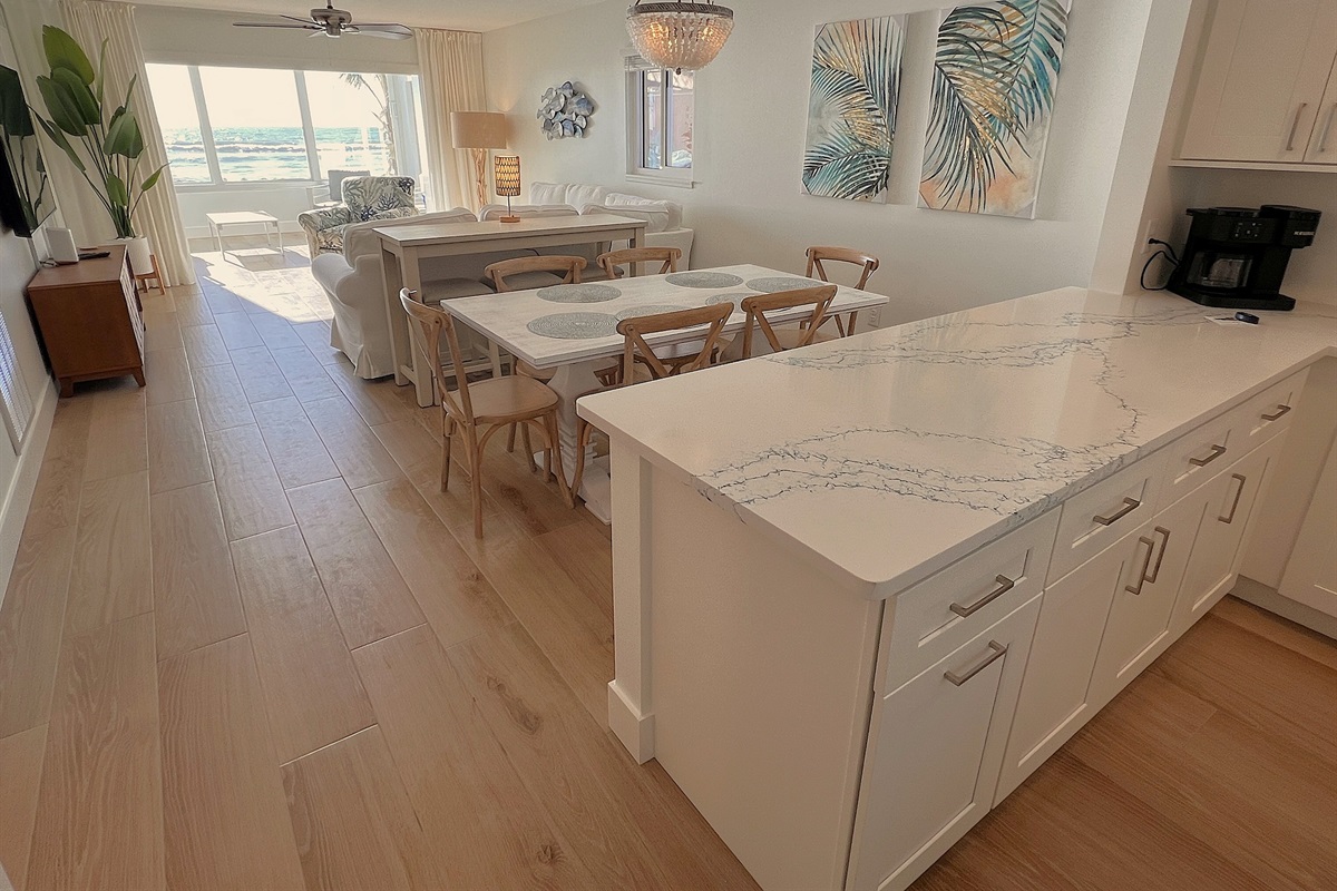 Brand new Coastal designed interior! Kitchen to Gulf view. 