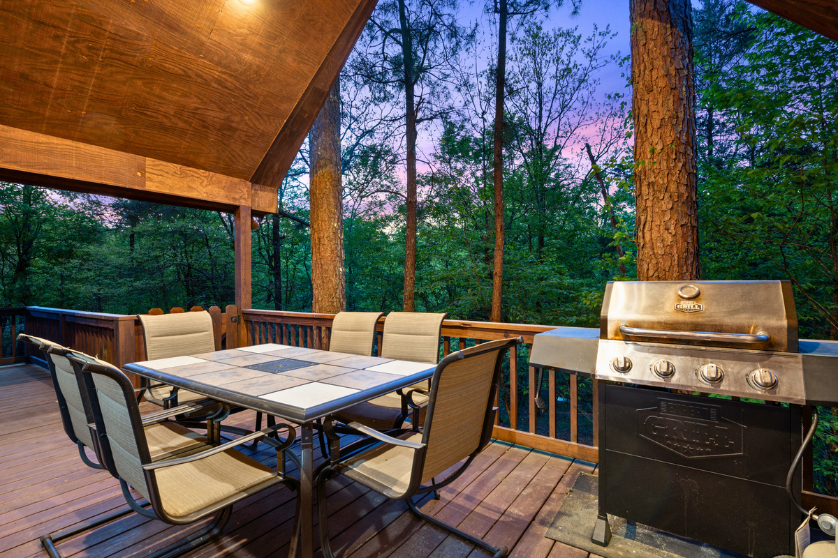 Whether you're enjoying a family meal or an evening chat, this covered deck is made for outdoor living at its finest.