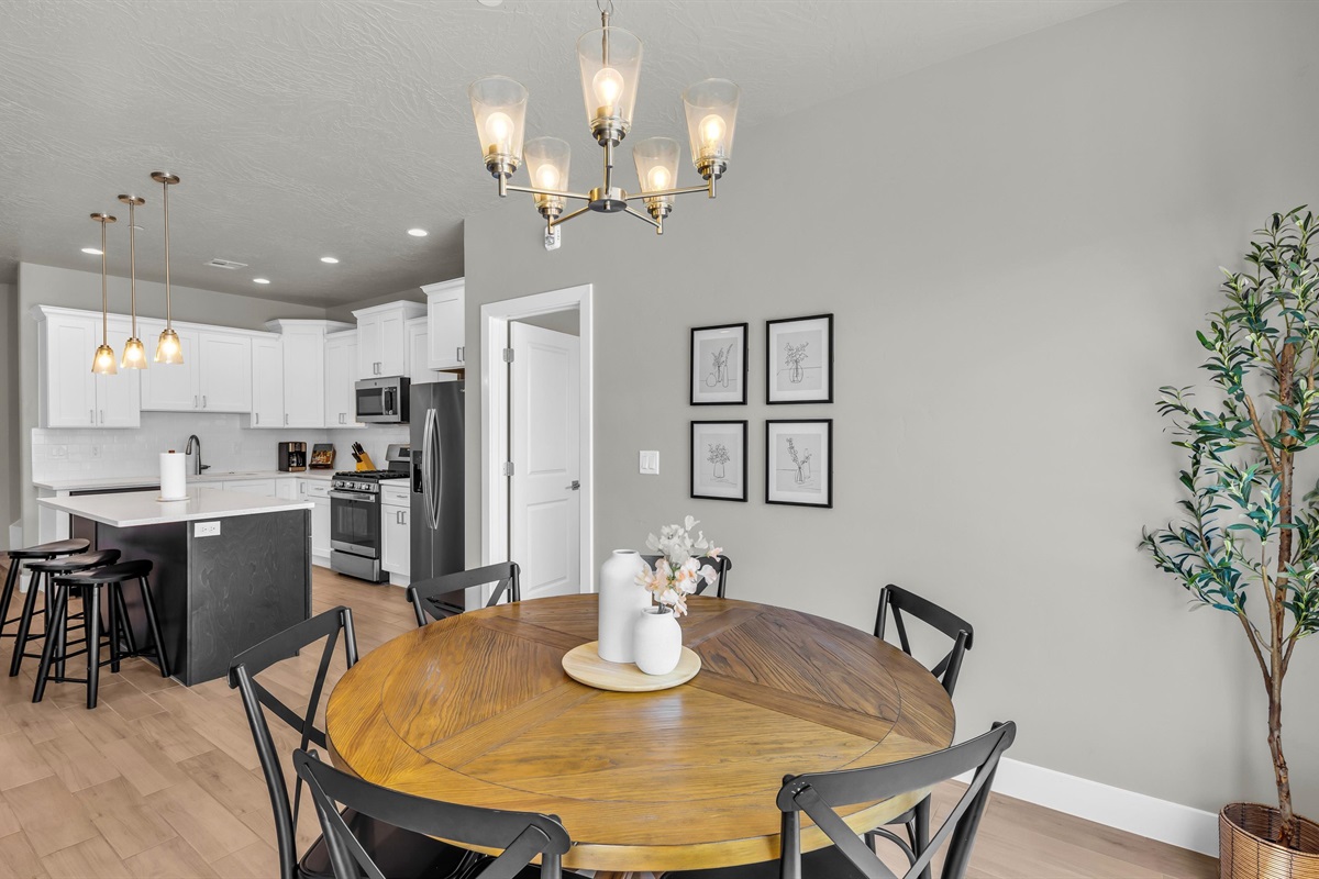 Bright Dining Nook under Elegant Chandelier
