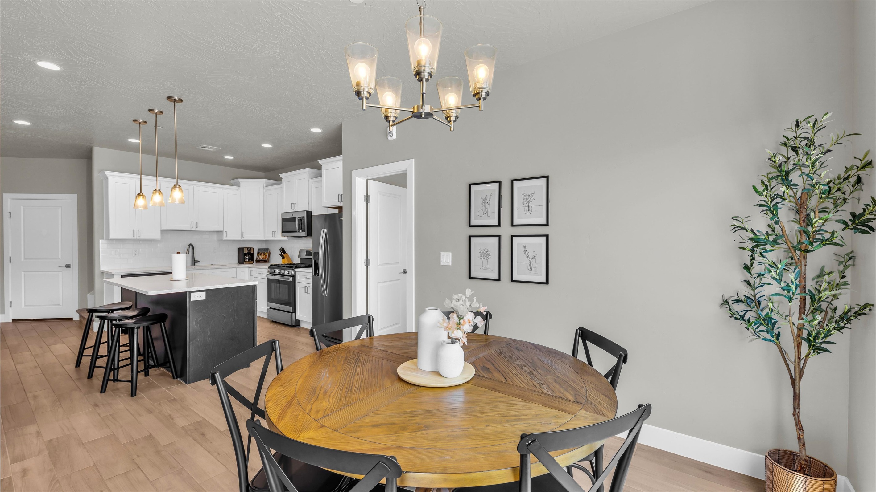 Bright Dining Nook under Elegant Chandelier