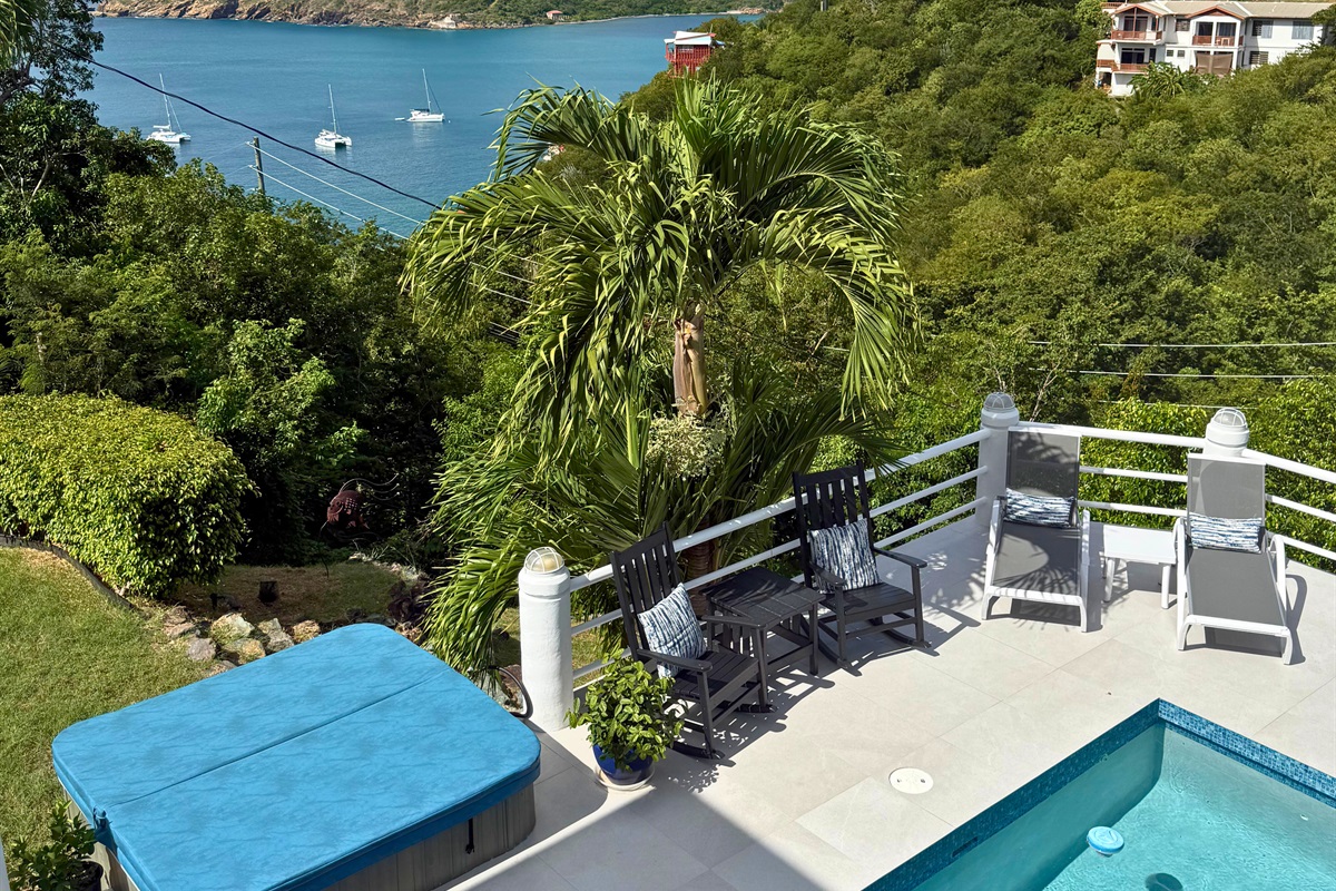 View of the pool and patio from the kitchen patio