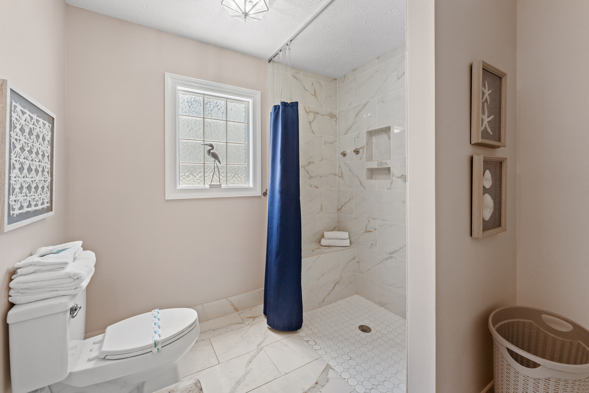 2nd Bathroom - Roll-in shower w/ adjustable spray handle