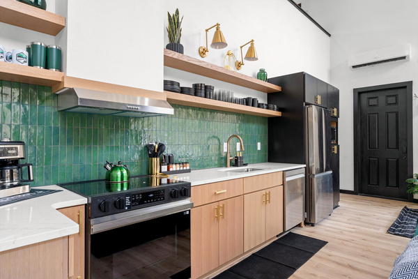 Cook up breakfast, snacks, or a gourmet meal in the fully stocked, design-forward kitchen for slow mornings or cozy nights in