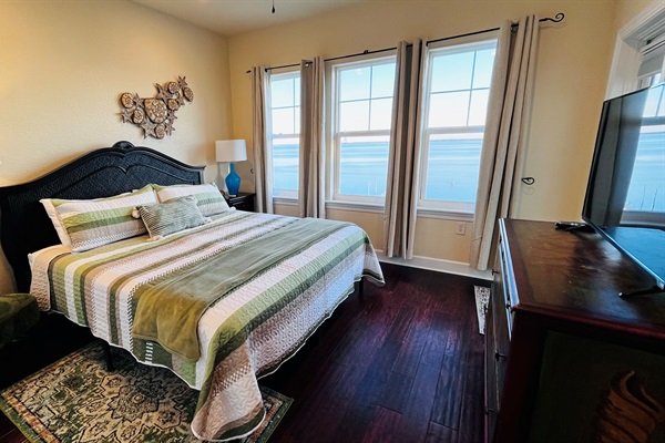 The comfortable king room has gorgeous views of The Sound with balcony access.